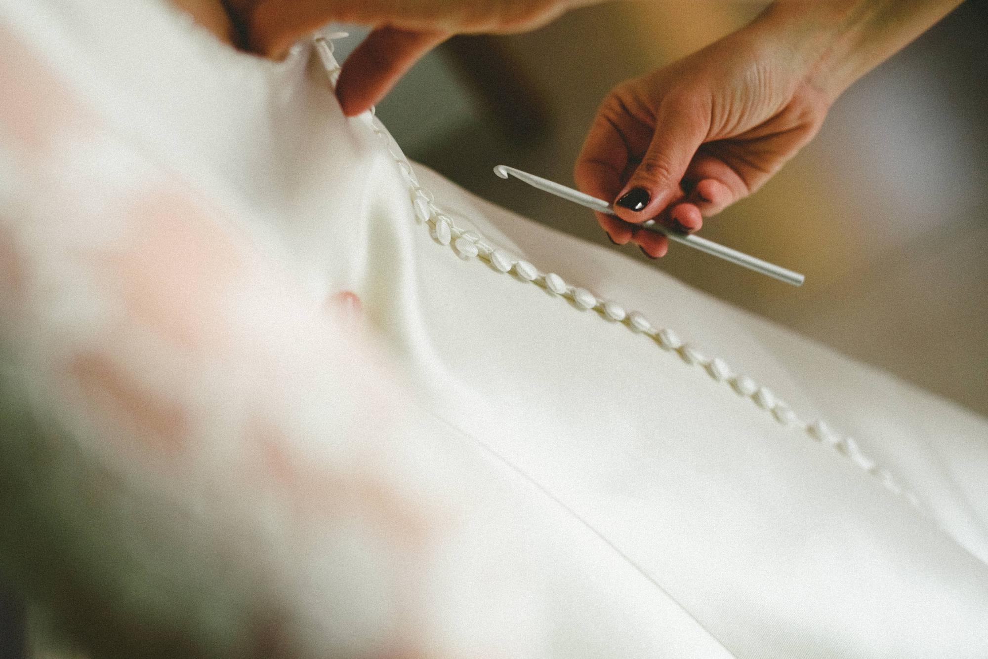 Detail of backstitch and satin stitch on cotton